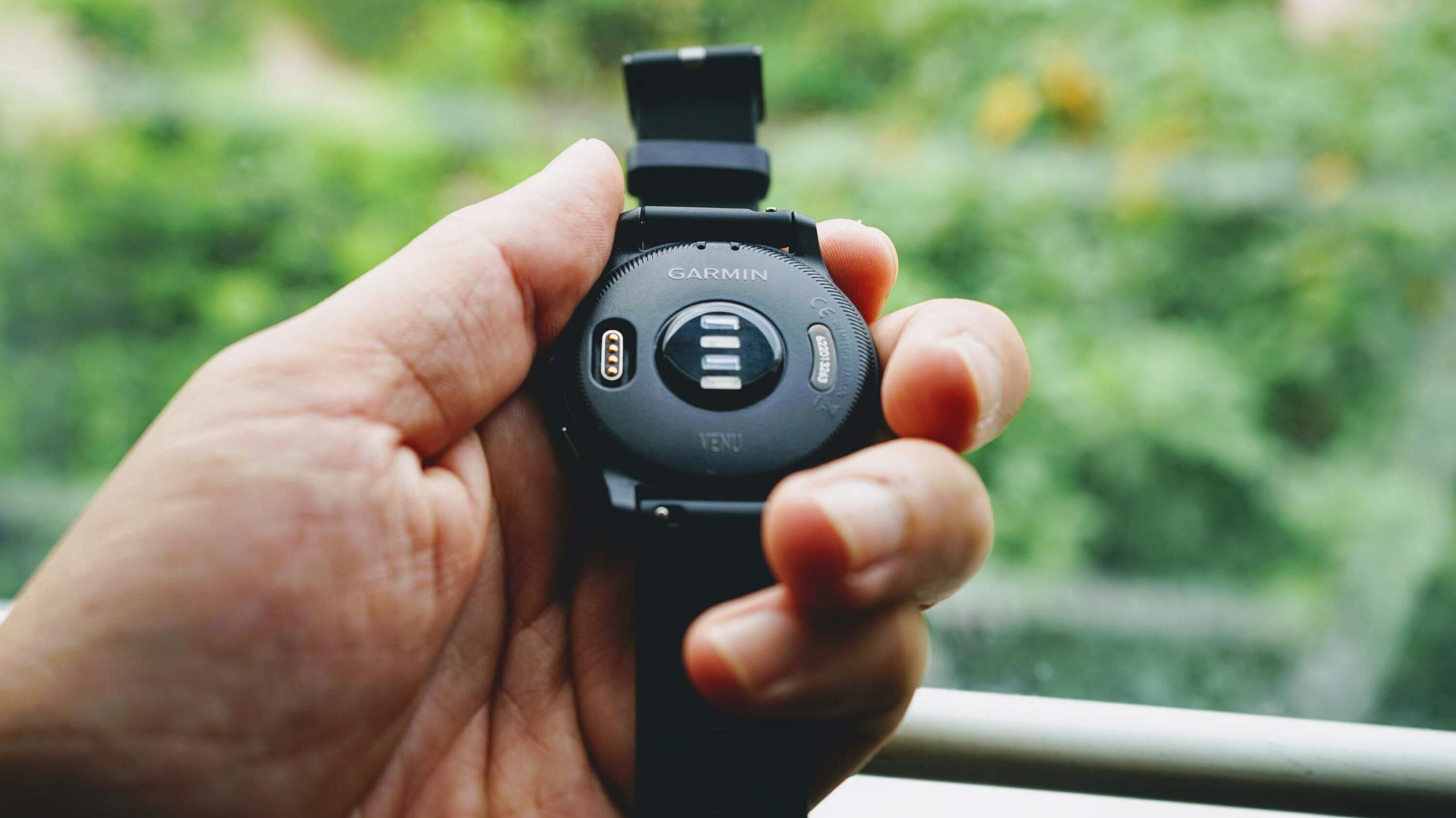 Garmin watch with its charging connector