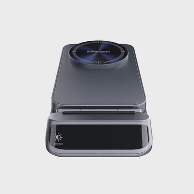The SwanScout 708M is a 3-in-1 wireless charging station that offers magnetic support for multiple devices, all within a sleek and elegant design that complements any setting. Its foldable and portable build makes it convenient for travel, while the integrated clock display adds a touch of both practicality and style. The high-end curved design, featuring smooth and defined lines, enhances its overall appeal, blending functionality with aesthetics.